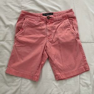 Men salmon colored flat front shorts